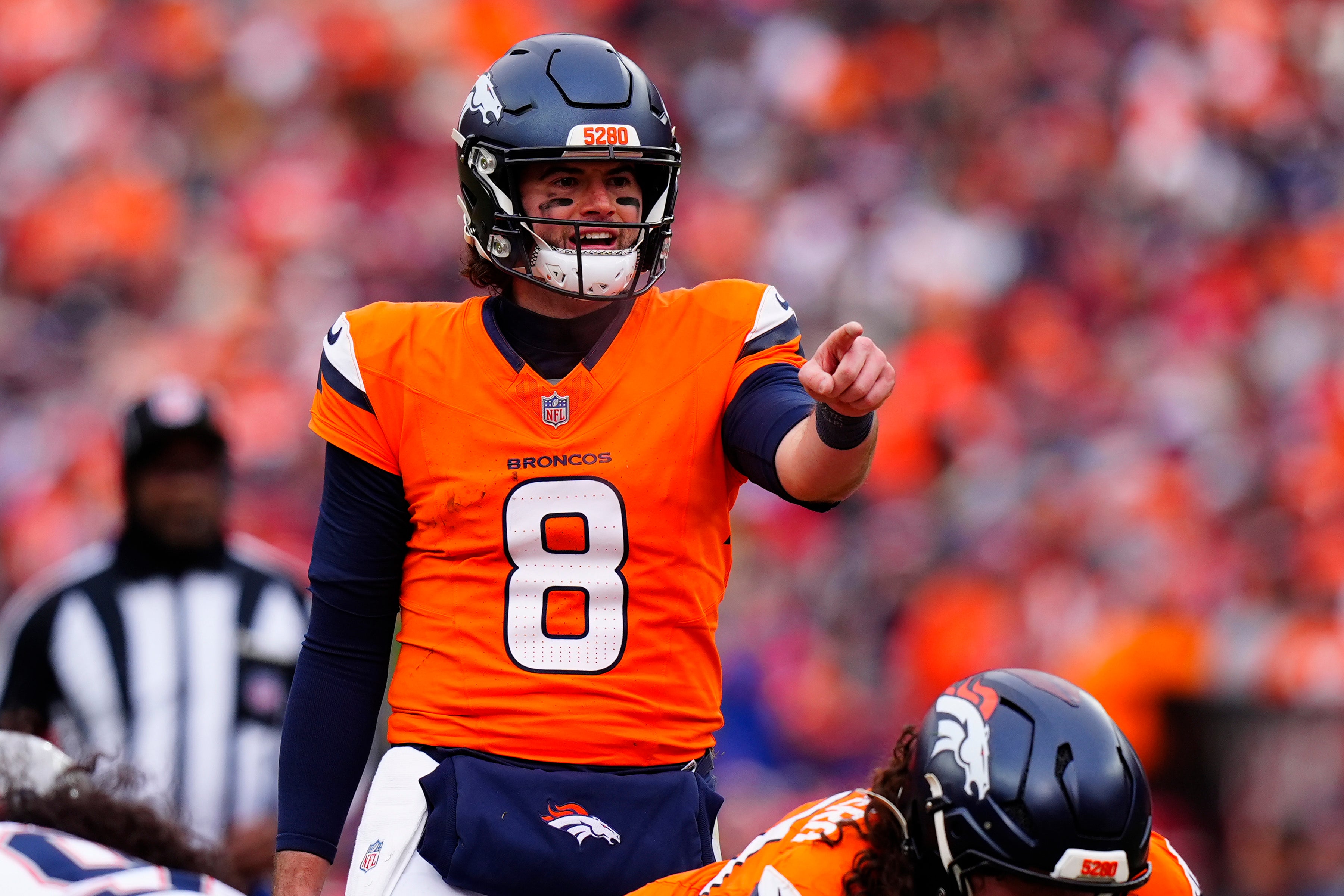 Jan 25, 2026; Denver, CO, USA; Denver Broncos quarterback Jarrett Stidham (8) reacts during the first half in the 2026 AFC Championship Game at Empower Field at Mile High.