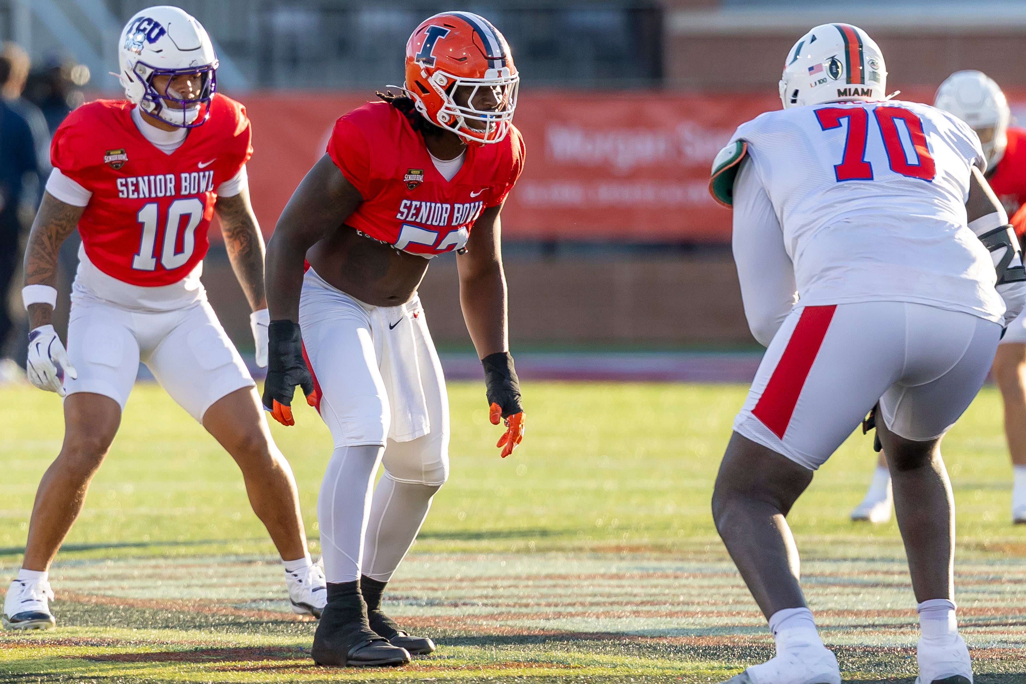 Jan 29, 2026; Mobile, AL, USA; American defensive lineman Gabe Jacas (52) of Illinois lines up during American Senior Bowl practice at Hancock Whitney Stadium.