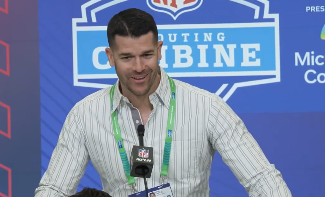 Carolina Panthers head coach Dave Canales speaks with reporters at the NFL Scouting Combine.
