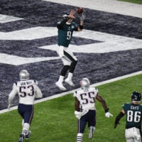 Feb 4, 2018; Minneapolis, MN, USA; Philadelphia Eagles quarterback Nick Foles (9) catches a touchdown pass against the New England Patriots in the second quarter in Super Bowl LII at U.S. Bank Stadium.