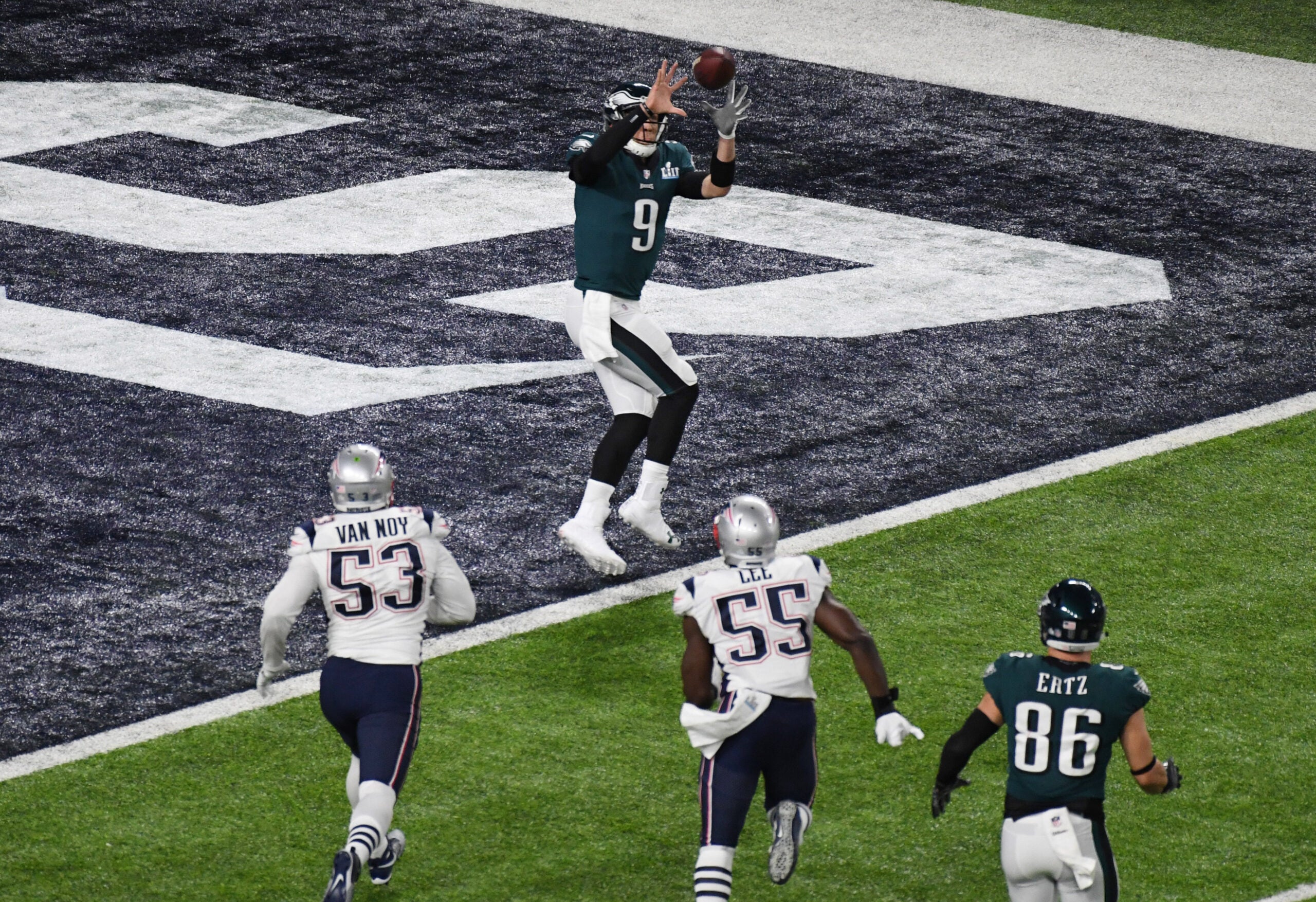 Feb 4, 2018; Minneapolis, MN, USA; Philadelphia Eagles quarterback Nick Foles (9) catches a touchdown pass against the New England Patriots in the second quarter in Super Bowl LII at U.S. Bank Stadium.