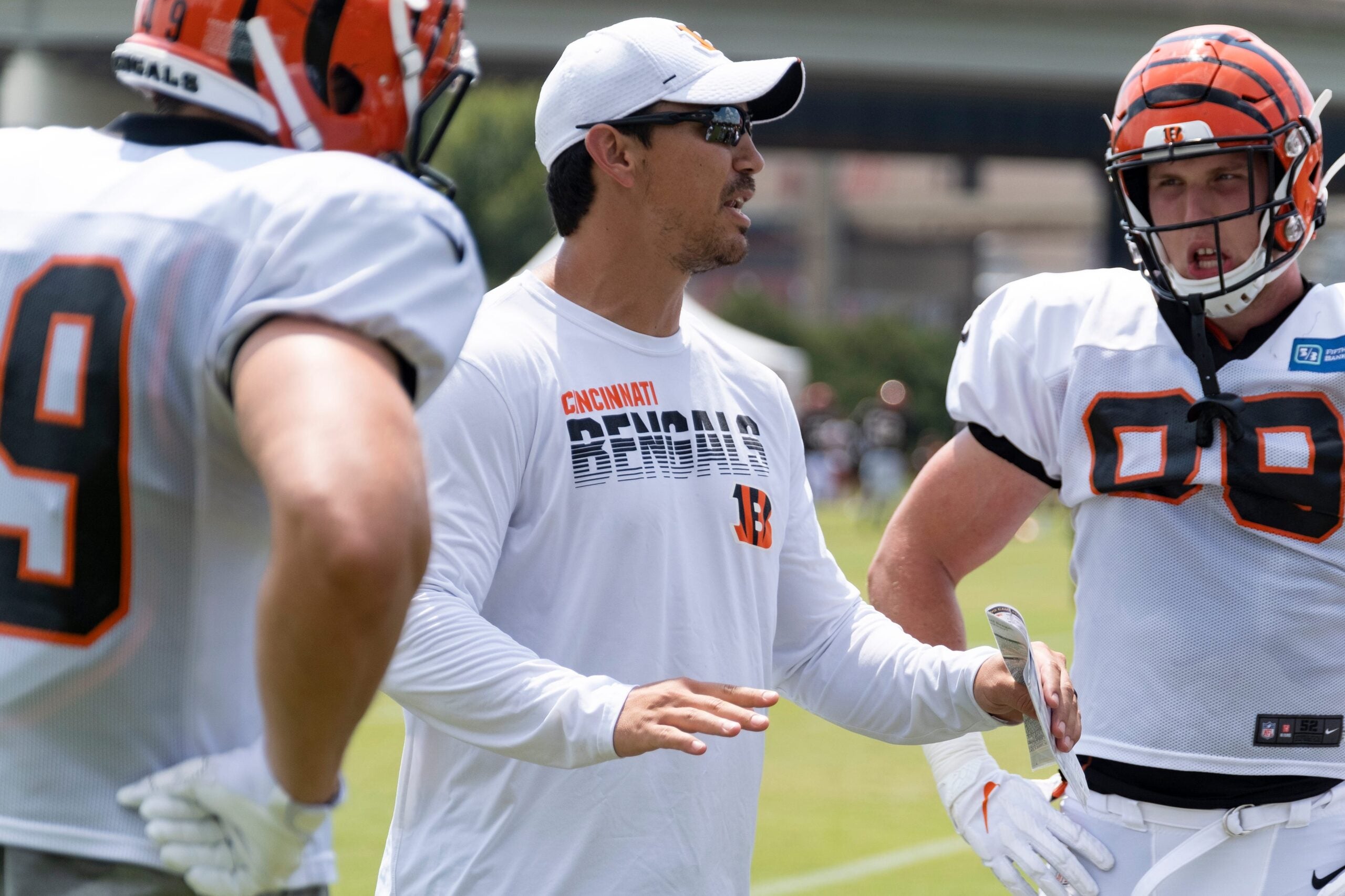 Bengals tight ends coach James Casey talks to players at the Cincinnati Bengals training camp on Wednesday July 31, 2019.