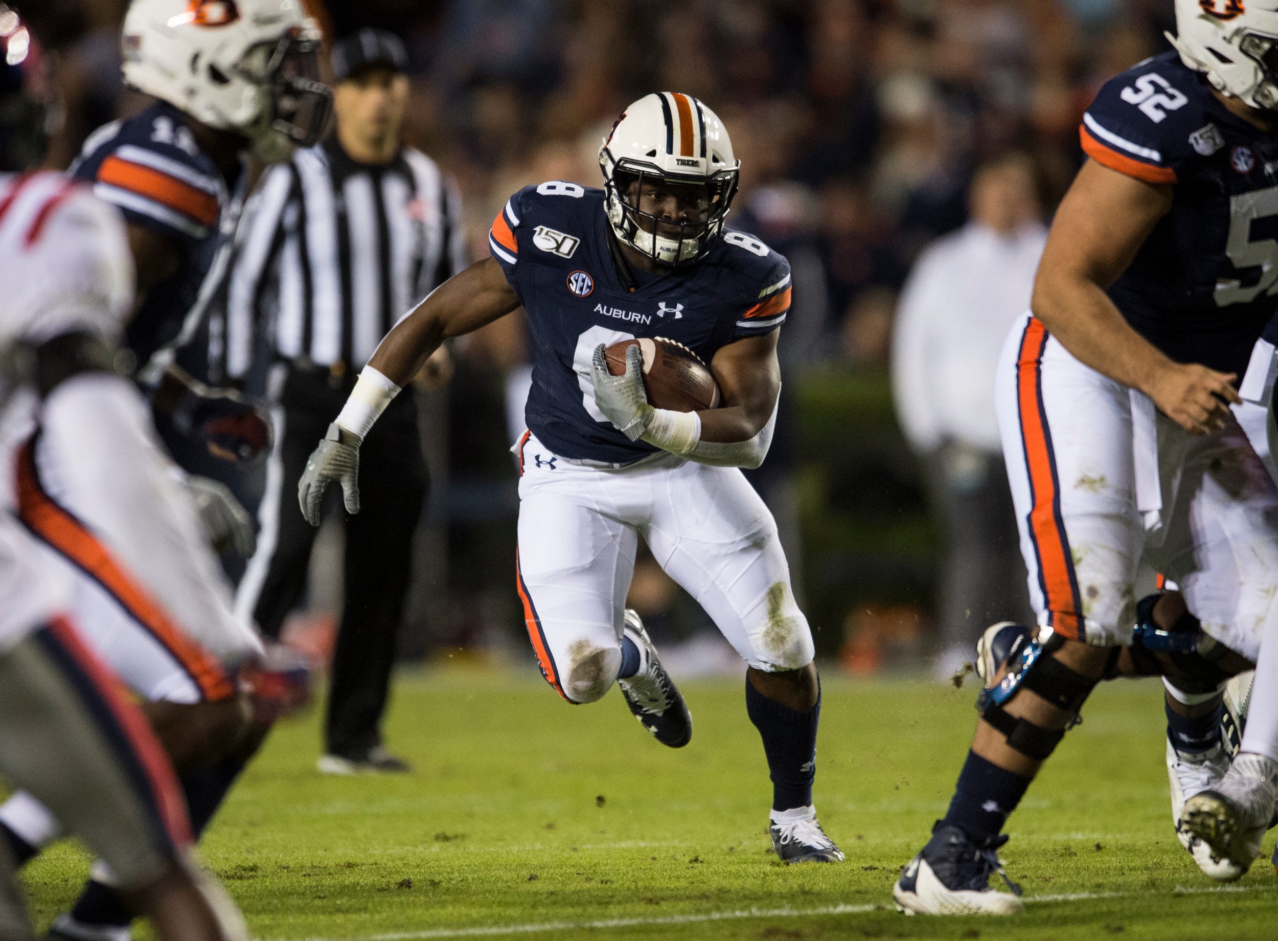 Auburn running back Shaun Shivers (8) runs the ball at Jordan-Hare Stadium in Auburn, Ala., on Saturday, Nov. 2, 2019. Auburn defeated Ole Miss 20-14.