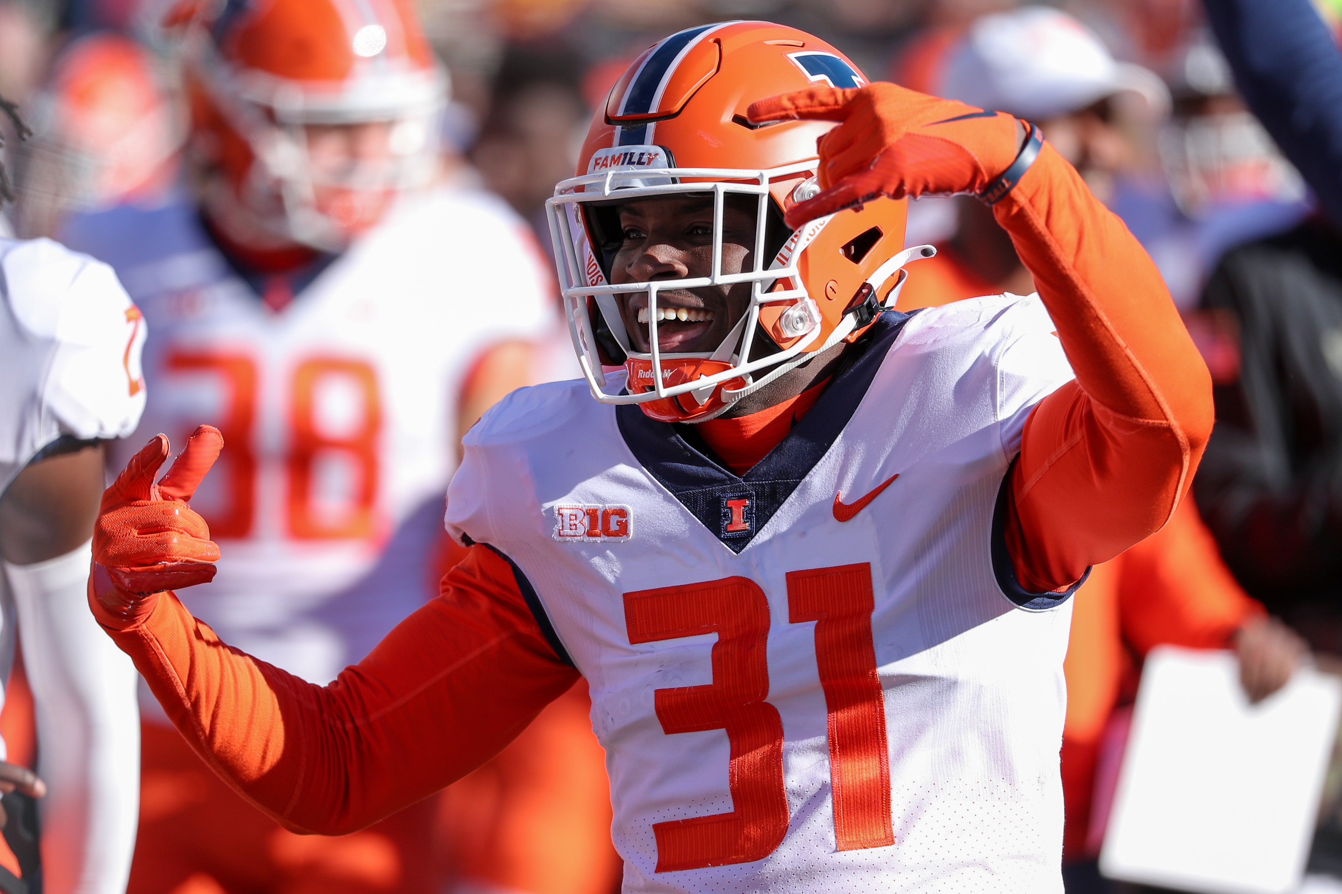 Nov 6, 2021; Minneapolis, Minnesota, USA; Illinois Fighting Illini defensive back Devon Witherspoon (31) celebrates a win against the Minnesota Golden Gophers in the fourth quarter at Huntington Bank Stadium. Mandatory Credit: Matt Krohn-USA TODAY Sports