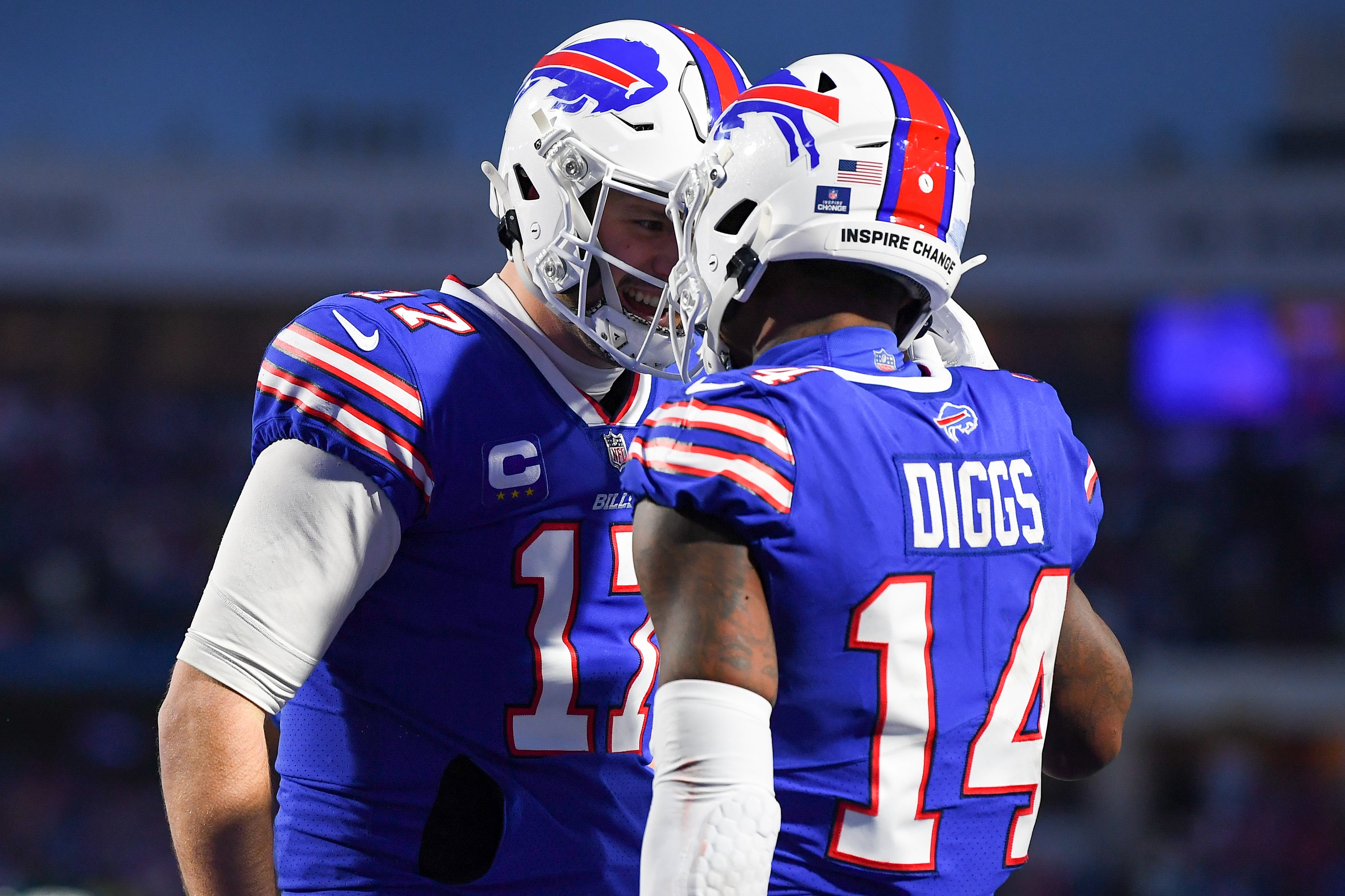 Jan 9, 2022; Orchard Park, New York, USA; Buffalo Bills wide receiver Stefon Diggs (14) celebrates a catch that was ruled incomplete with teammate quarterback Josh Allen (17) against the New York Jets during the first half at Highmark Stadium.