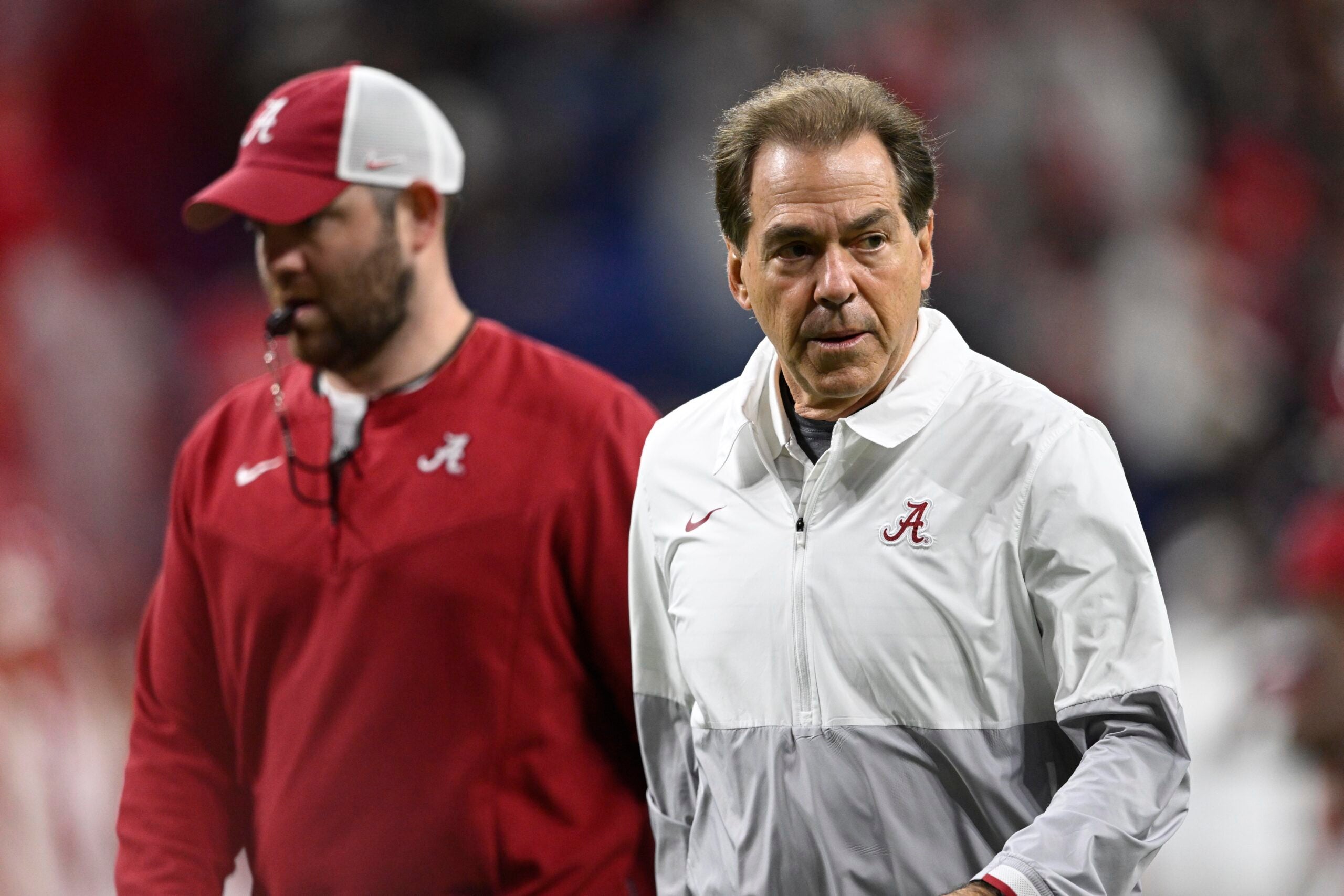 Jan 10, 2022; Indianapolis, IN, USA; Alabama Crimson Tide head coach Nick Saban runs off the field before playing against the Georgia Bulldogs during the 2022 CFP college football national championship game at Lucas Oil Stadium.