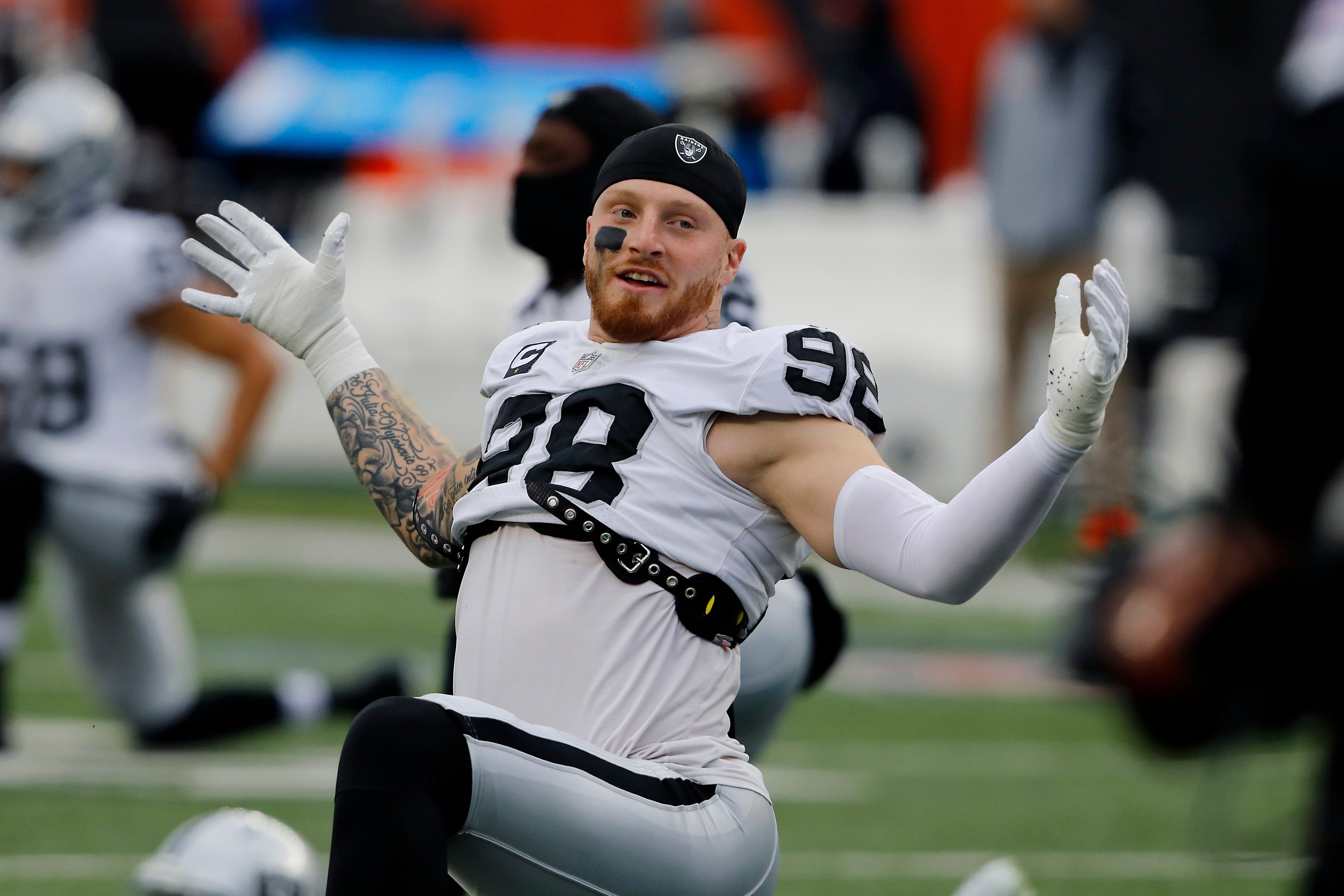 Jan 15, 2022; Cincinnati, Ohio, USA; Las Vegas Raiders defensive end Maxx Crosby (98) warms up before the AFC Wild Card playoff football game against the Cincinnati Bengals at Paul Brown Stadium.