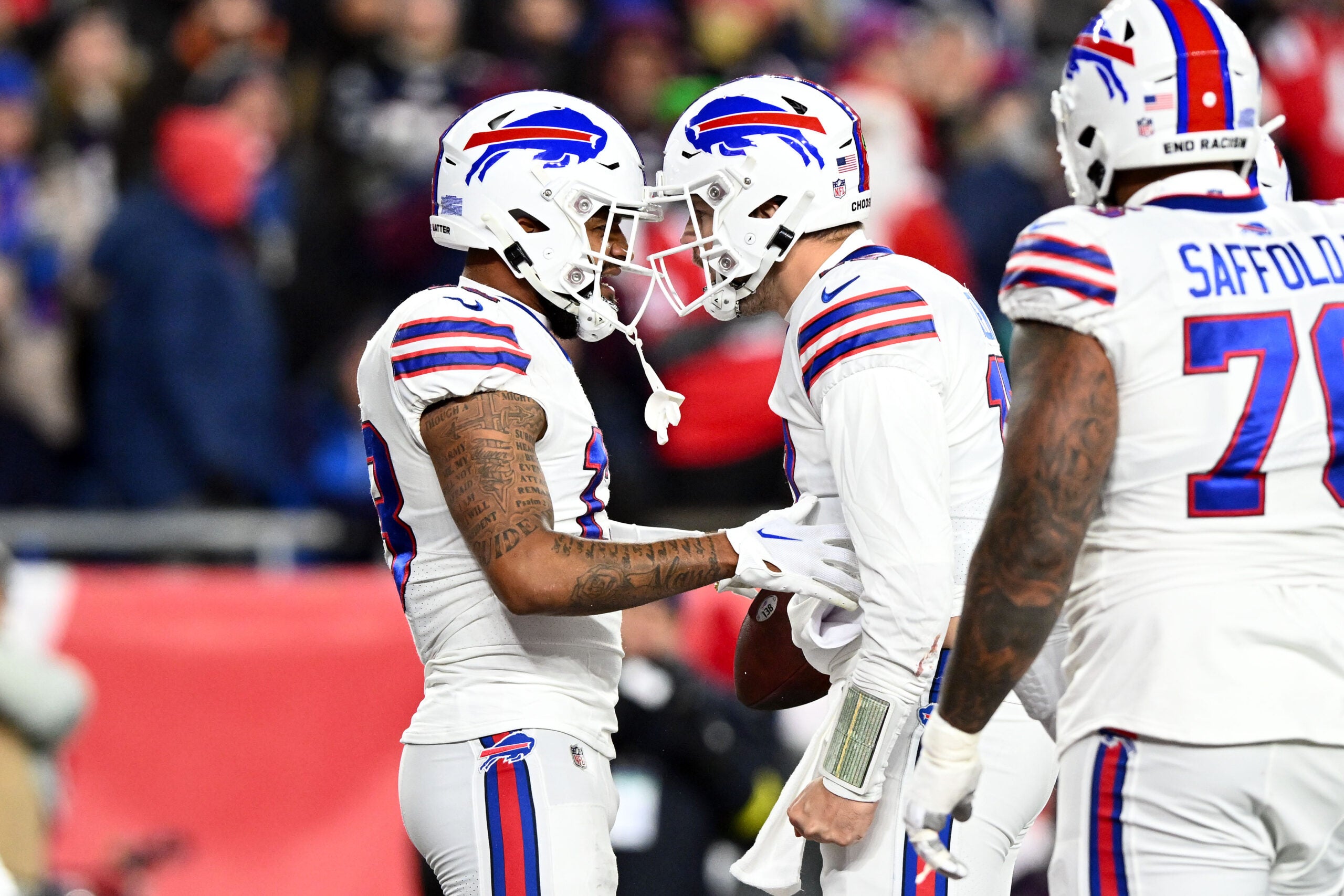 Dec 1, 2022; Foxborough, Massachusetts, USA; Buffalo Bills wide receiver Gabe Davis (13) celebrates with Buffalo quarterback Josh Allen (17) after scoring a touchdown against the New England Patriots during the first half at Gillette Stadium.