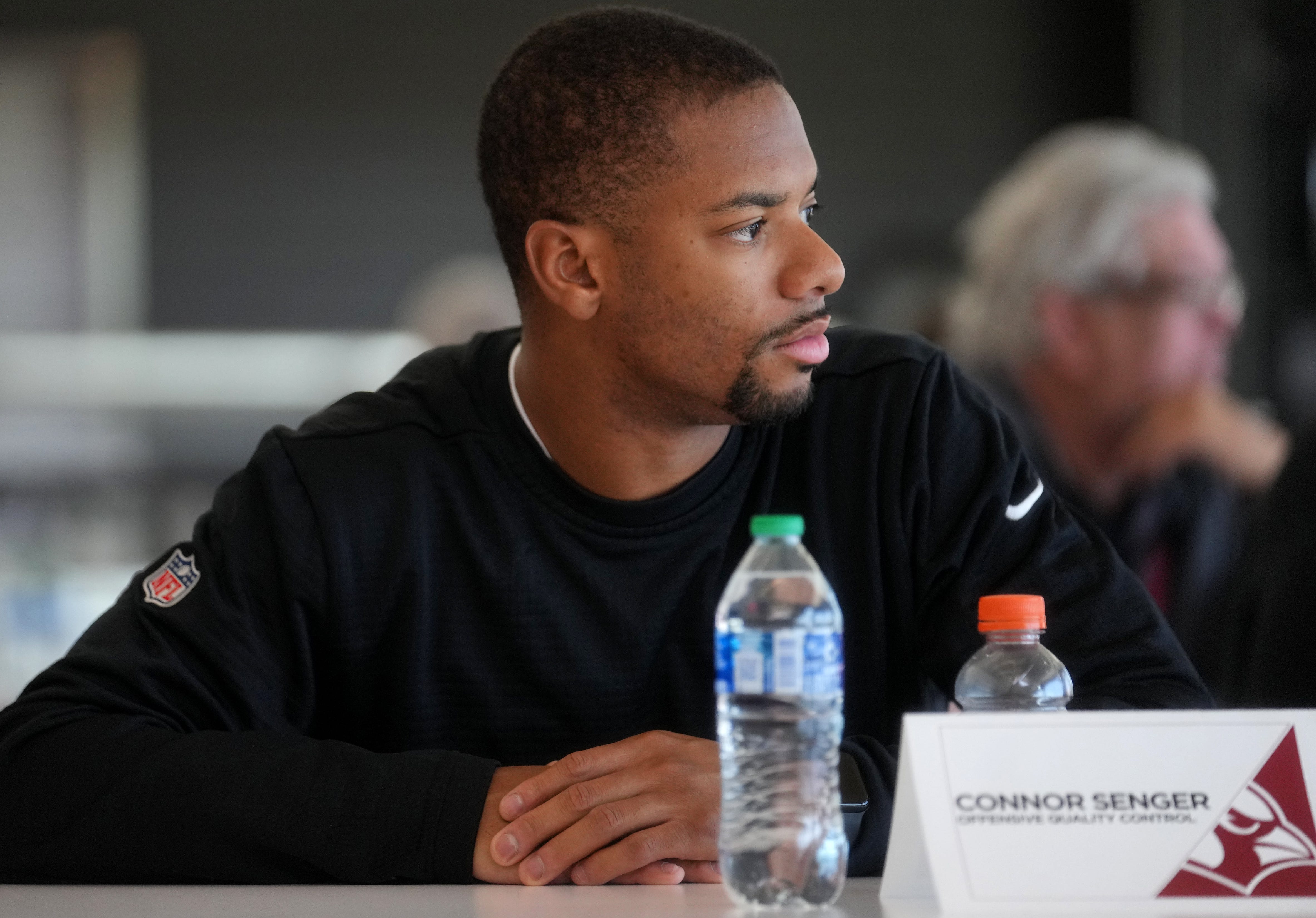 Mar 8, 2023; Tempe, AZ, USA; Arizona Cardinals offensive quality control coach Connor Senger speaks with the media as new coaching staff hires are introduced at Arizona Cardinals facility.
