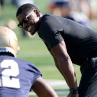 Notre Dame running backs coach Deland McCullough confers with freshman RB Jeremiyah Love during Notre Dame football fall camp Thursday, July 27, 2023, at the LaBar Practice Complex in South Bend.