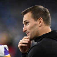 Jan 7, 2024; Detroit, Michigan, USA; Minnesota Vikings quarterback Kirk Cousins (8) talks with teammates prior to their game against the Detroit Lions at Ford Field.