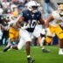 Penn State running back Nick Singleton (10) carries the ball in the second half of an NCAA football game against Kent State, Saturday, Sept. 21, 2024, in State College, Pa.