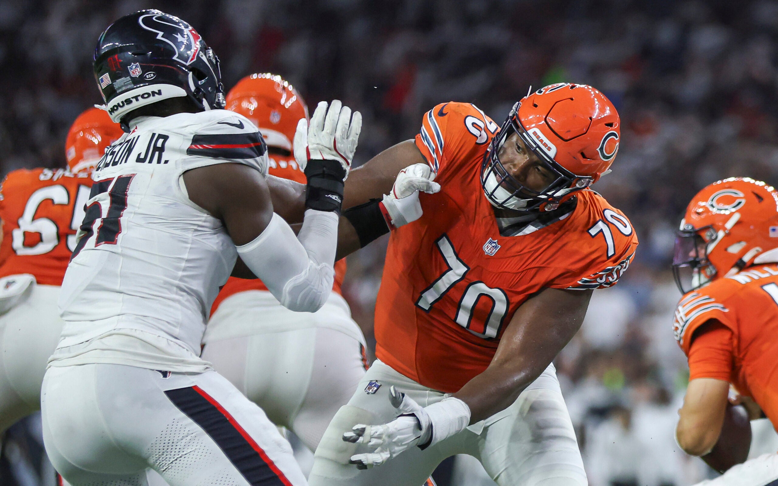 Sep 15, 2024; Houston, Texas, USA; Chicago Bears offensive tackle Braxton Jones (70) defends against Houston Texans defensive end Will Anderson Jr. (51) during the game at NRG Stadium.