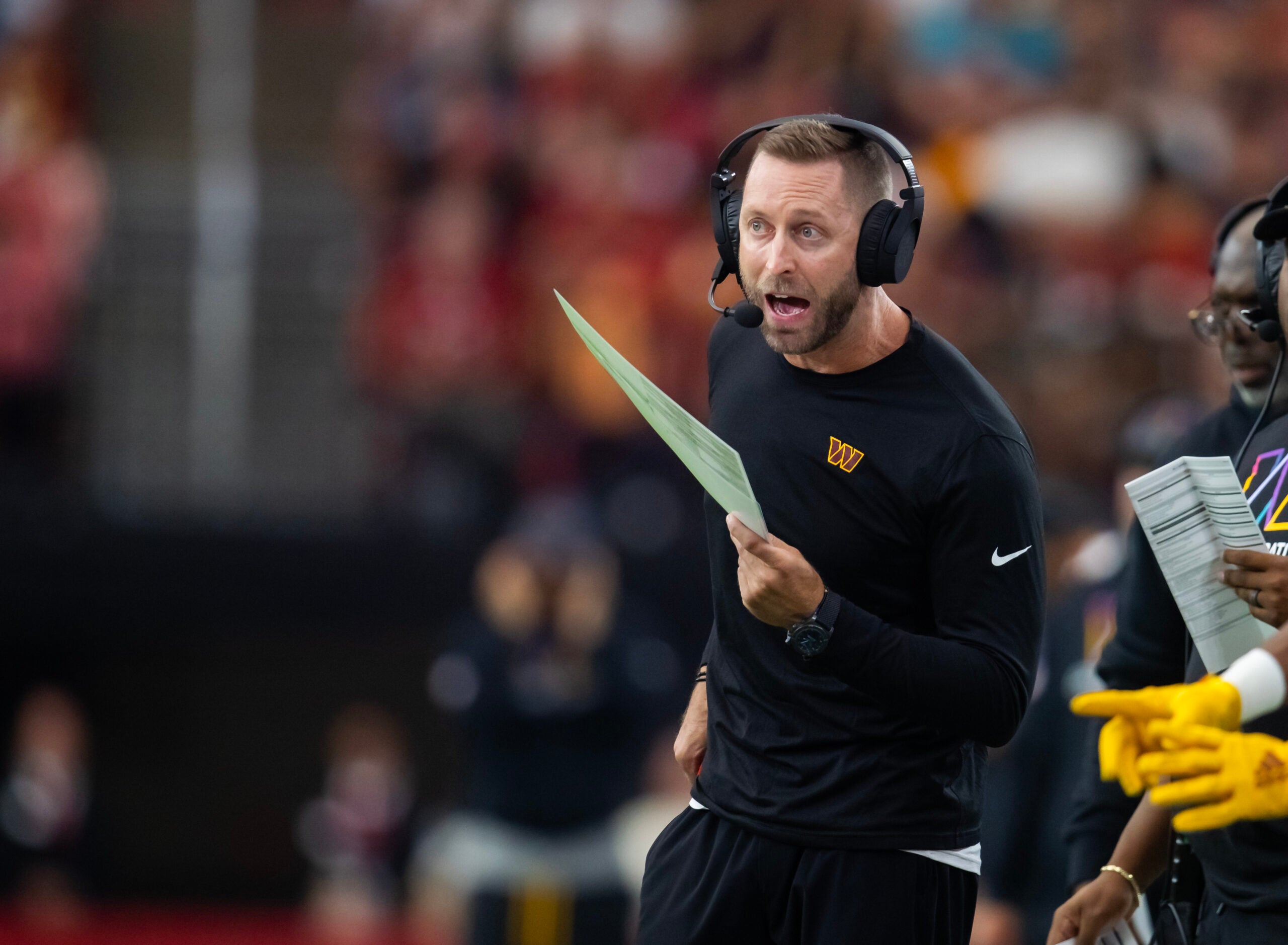Sep 29, 2024; Glendale, Arizona, USA; Washington Commanders offensive coordinator Kliff Kingsbury against the Arizona Cardinals in the second half at State Farm Stadium.