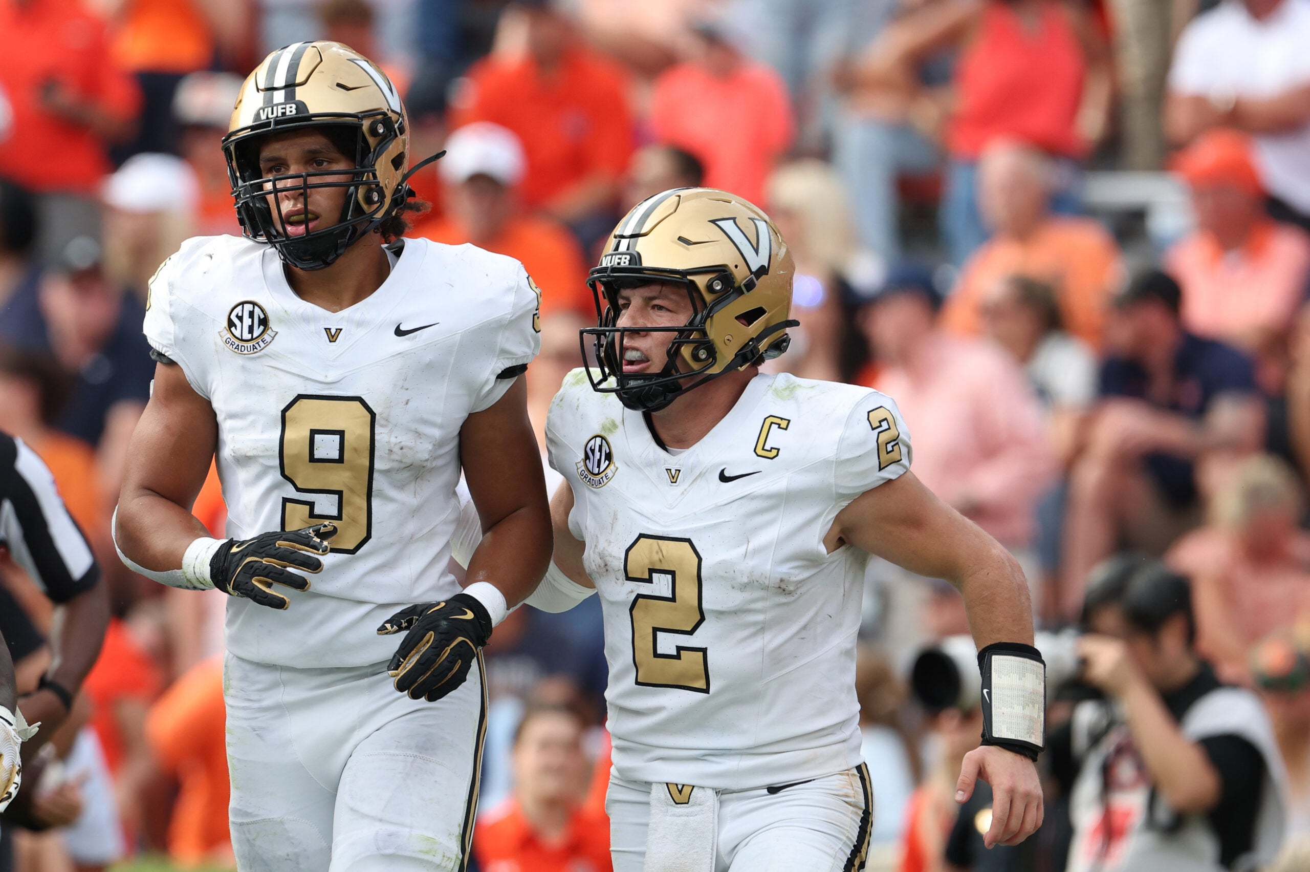 Nov 2, 2024; Auburn, Alabama, USA; Vanderbilt Commodores quarterback Diego Pavia (2) celebrates with tight end Eli Stowers (9) after a touchdown during the fourth quarter against the Auburn Tigers at Jordan-Hare Stadium. Mandatory Credit: John Reed-Imagn Images