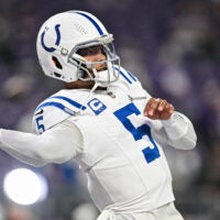 Nov 3, 2024; Minneapolis, Minnesota, USA; Indianapolis Colts quarterback Anthony Richardson (5) warms up before the game against the Minnesota Vikings at U.S. Bank Stadium.