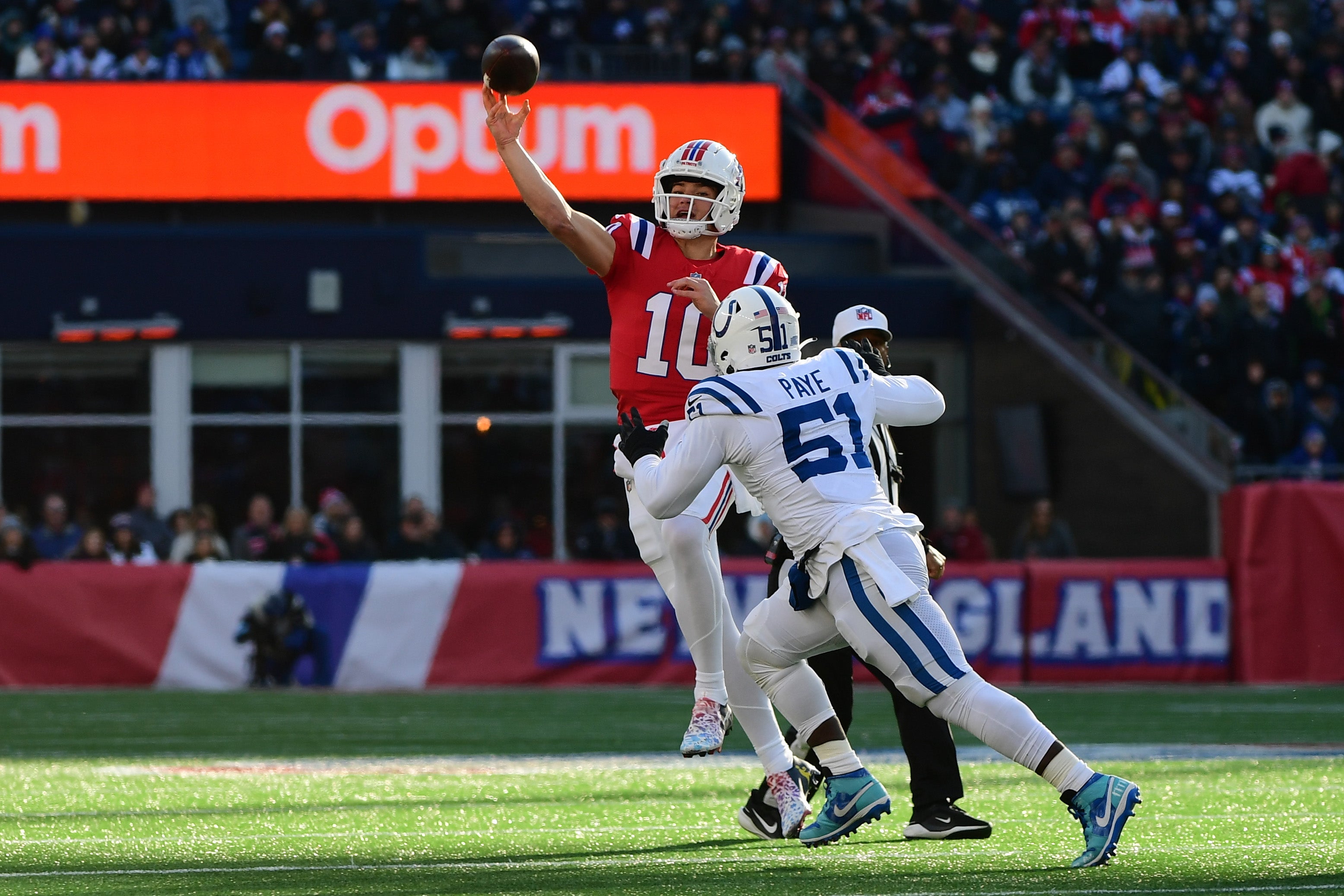 Colts edge rusher Kwity Paye pursues Patriots QB Drake Maye