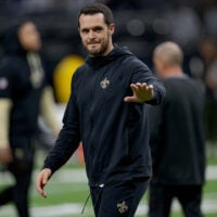 Dec 29, 2024; New Orleans, Louisiana, USA; New Orleans Saints quarterback Derek Carr (4) walks the field before a game against the Las Vegas Raiders at Caesars Superdome.