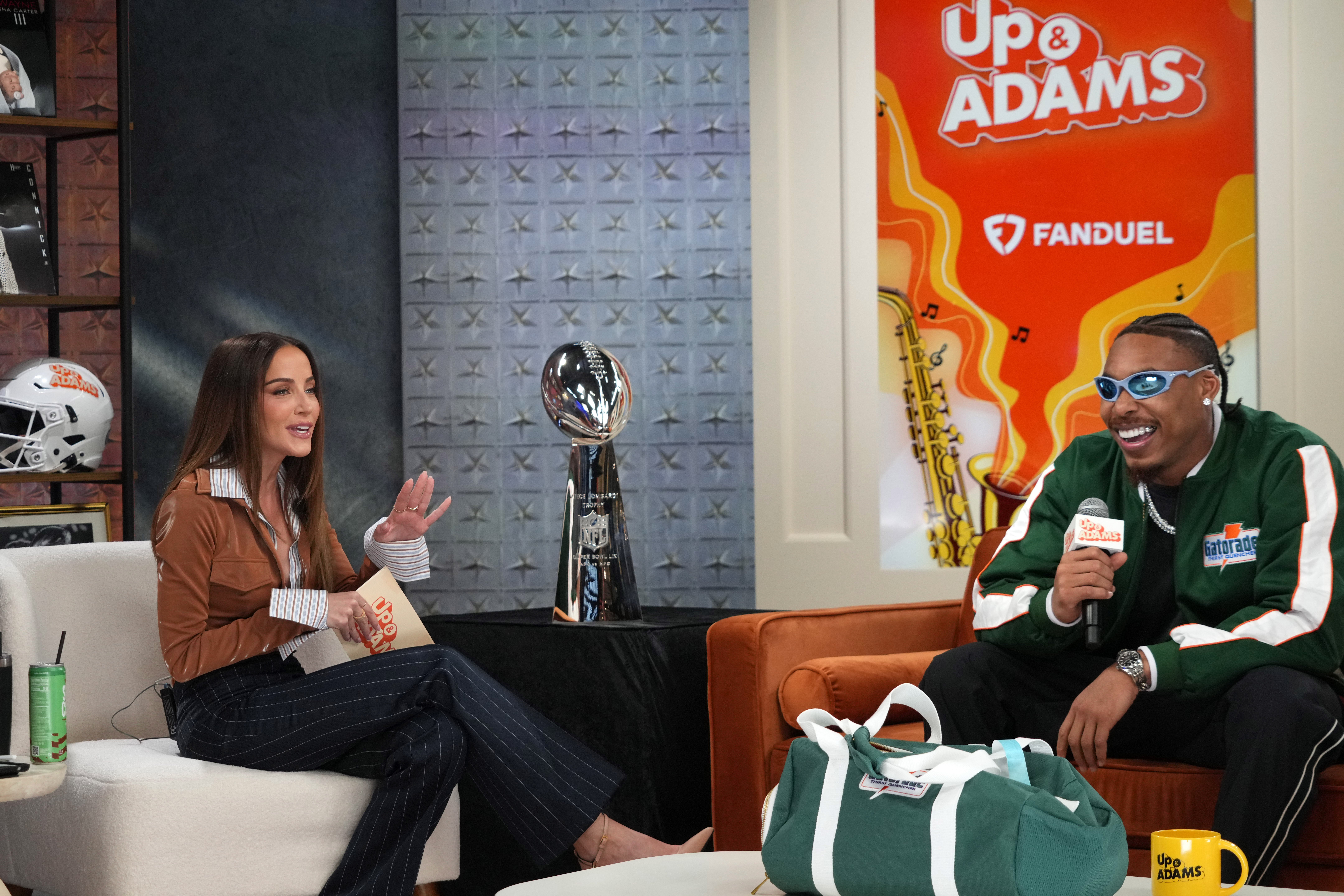 Feb 7, 2025; New Orleans, LA, USA; Kay Adams (left) interviews Minnesota Vikings receiver Justin Jefferson on the Up & Adams set on Radio Row at the Super Bowl LIX media center.