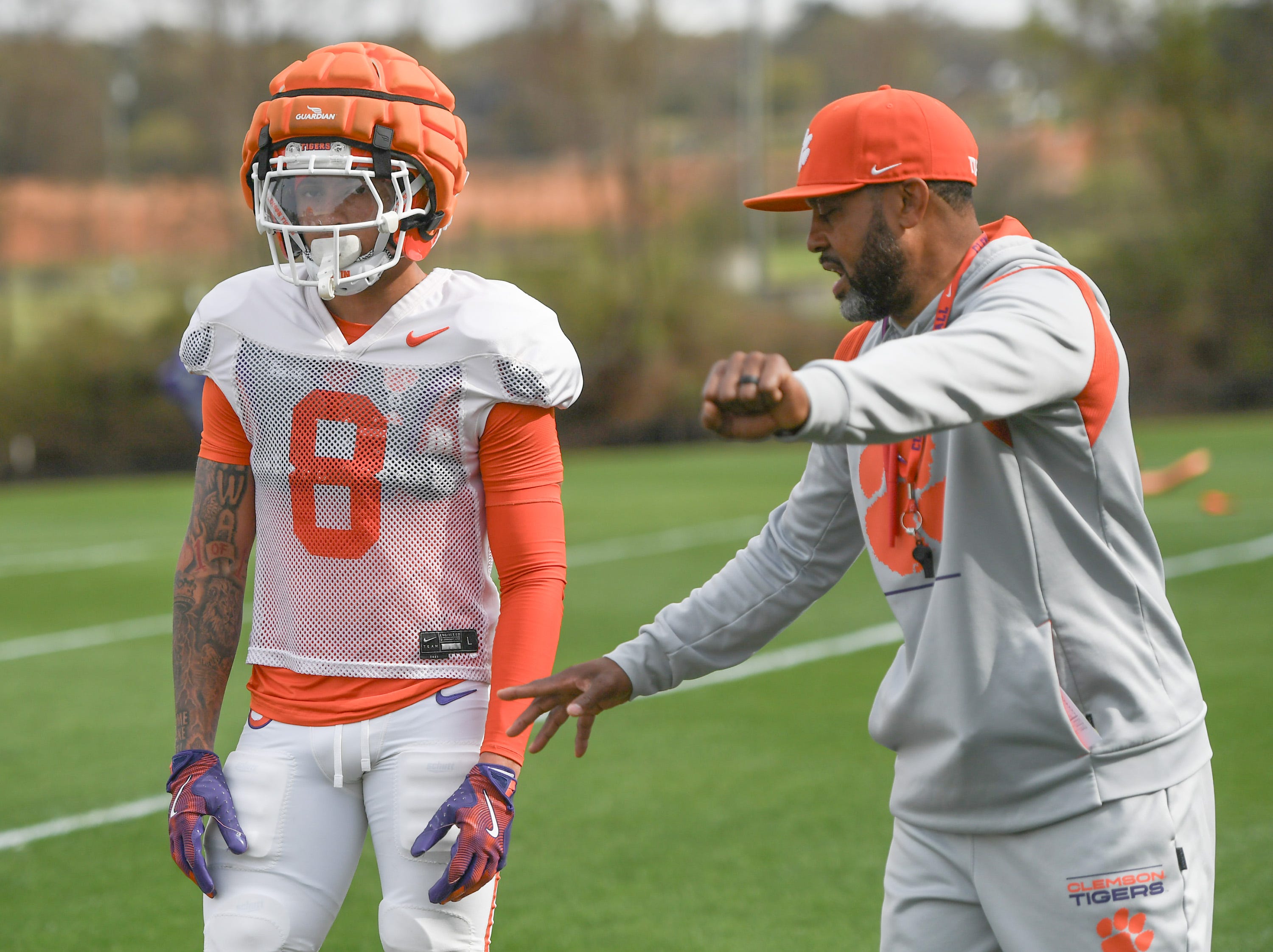 Clemson cornerbacks coach Mike Reed instructs Avieon Terrell (8) during Spring Practice in Clemson, S.C. Monday, March 24, 2025.