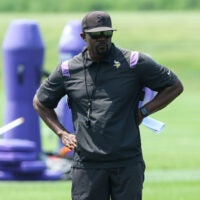 Jun 10, 2025; Minneapolis, MN, USA; Minnesota Vikings defensive coordinator Brian Flores watches practices during minicamp at the Minnesota Vikings Training Facility.