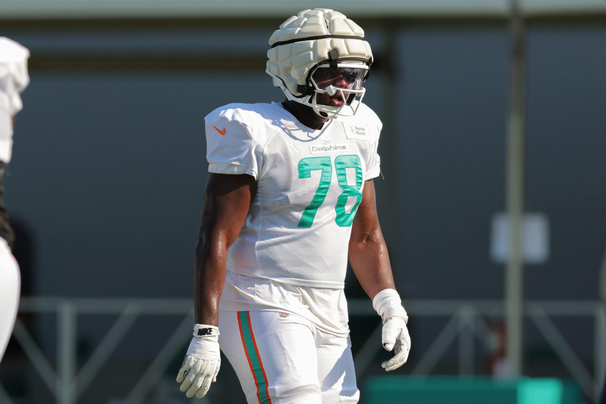 Jul 29, 2025; Miami Gardens, FL, USA; Miami Dolphins guard James Daniels (78) works on the field during training camp at Baptist Health Training Complex.
