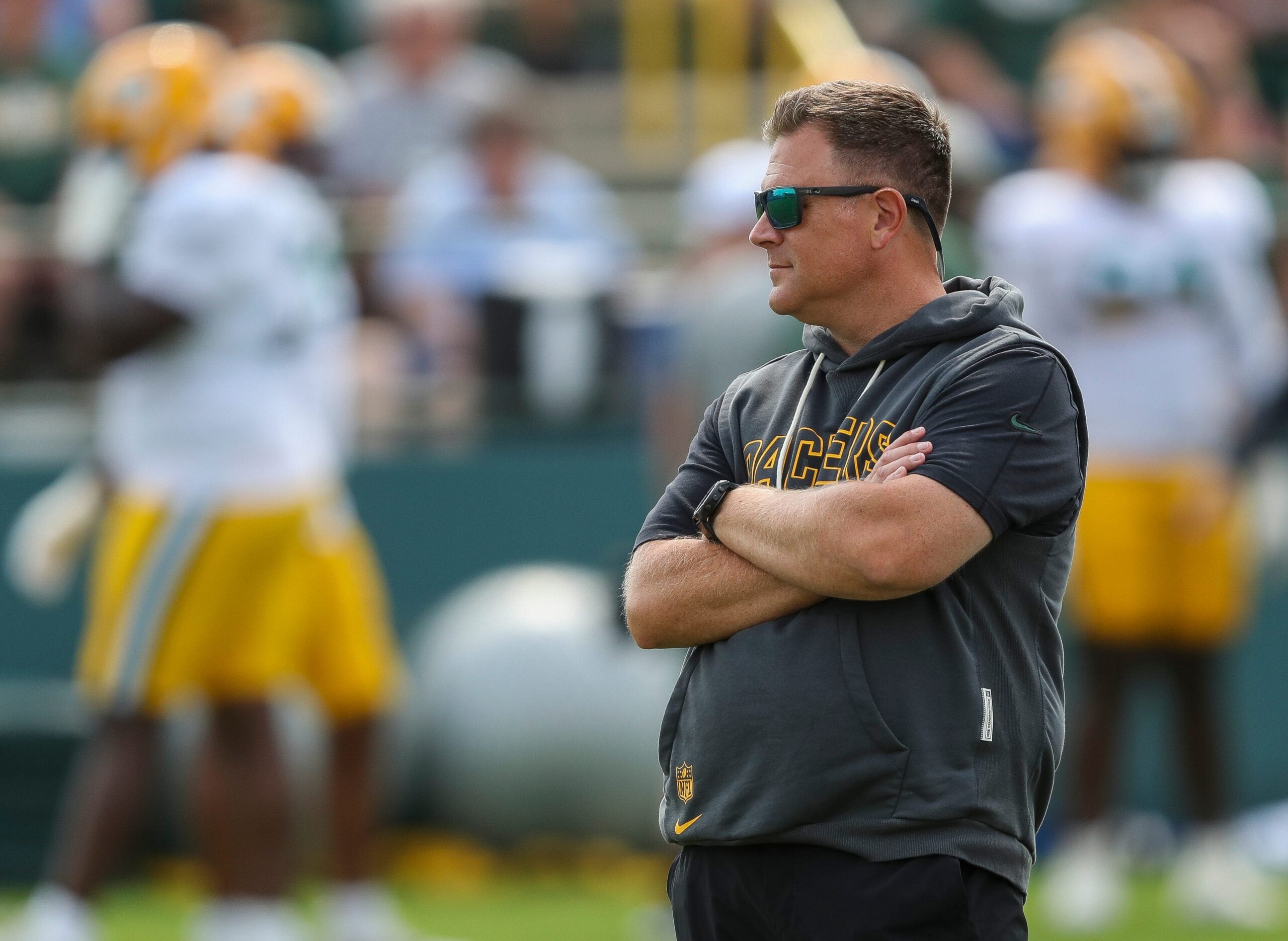 Green Bay Packers general manager Brian Gutekunst surveys practice on Tuesday, August 12, 2025, at Ray Nitschke Field in Ashwaubenon, Wis.