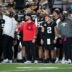 Vanderbilt quarterback Diego Pavia (2) and Vanderbilt defensive line coach Larry Black, far right, have a laugh late in the second half of their game at FirstBank Stadium in Nashville, Tenn., Saturday, Aug. 30, 2025.