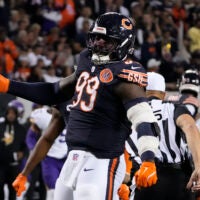 Sep 8, 2025; Chicago, Illinois, USA; Chicago Bears defensive tackle Gervon Dexter Sr. (99) reacts after a sack against the Minnesota Vikings during the second half at Soldier Field.