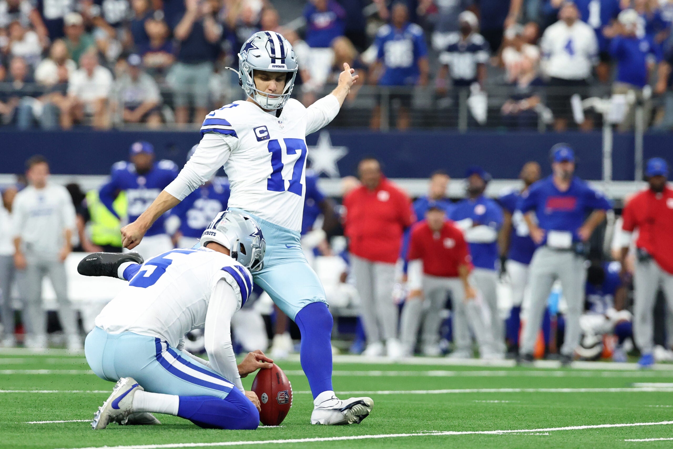 Sep 14, 2025; Arlington, Texas, USA; Dallas Cowboys place kicker Brandon Aubrey (17) kicks the game-winning field goal against the New York Giants during overtime at AT&T Stadium.