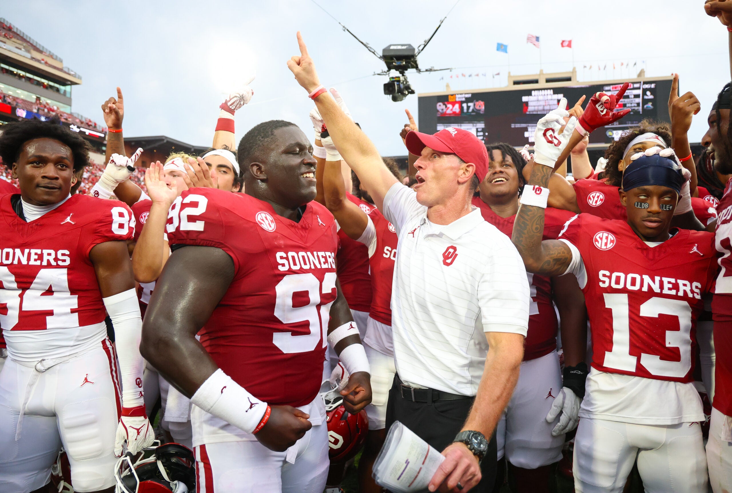 Sep 20, 2025; Norman, Oklahoma, USA; Oklahoma Sooners head coach Brent Venables celebrates with his team after the game against the Auburn Tigers at Gaylord Family-Oklahoma Memorial Stadium.