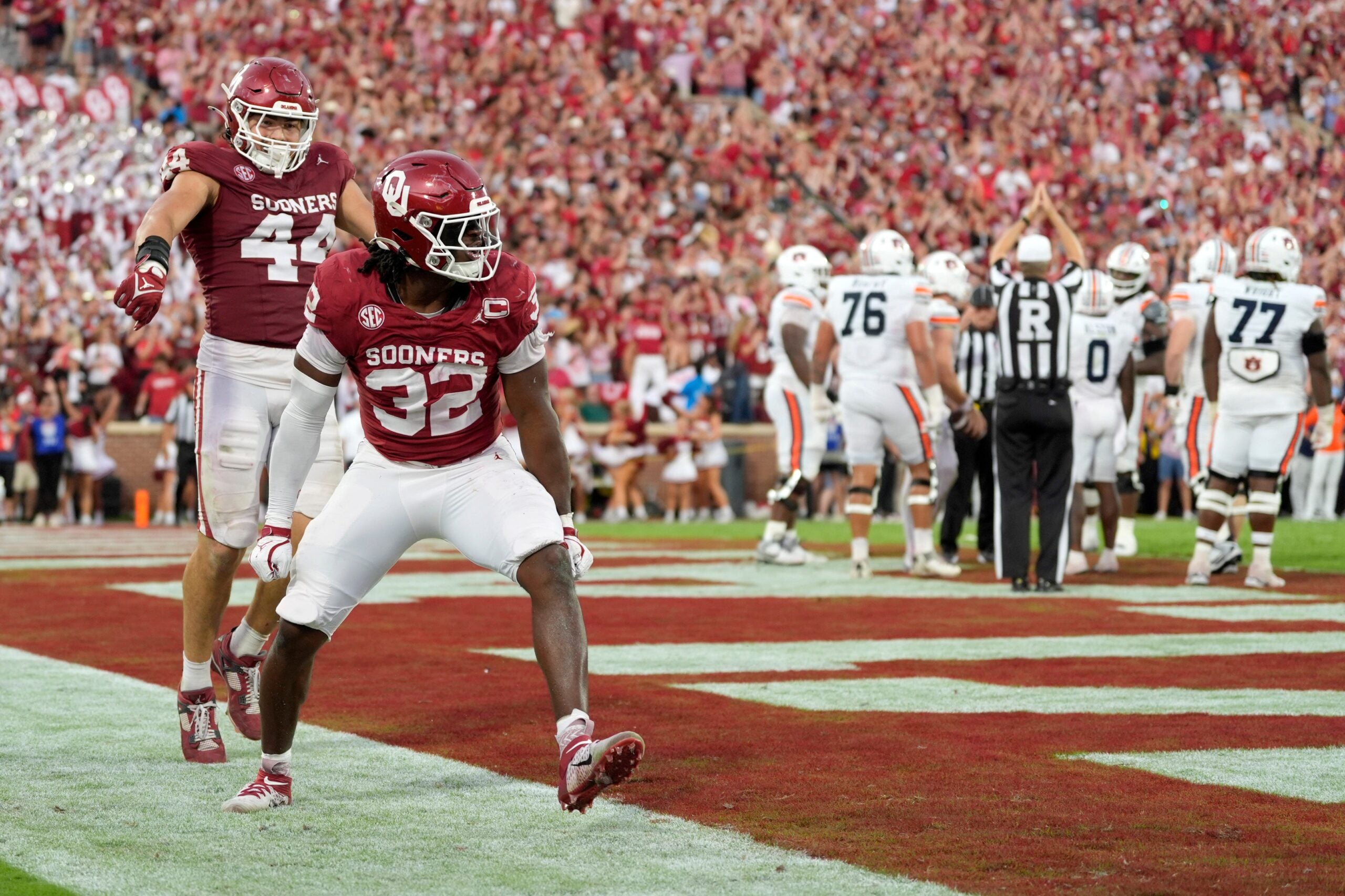 Oklahoma Sooners defensive lineman R Mason Thomas (32) and defensive lineman Taylor Wein (44) celebrate after a safety during a college football game between the University of Oklahoma Sooners (OU) and the Auburn Tigers at Gaylord Family Ð Oklahoma Memorial Stadium in Norman, Okla., Saturday,Sept. 20, 2025. Oklahoma won 24-17.