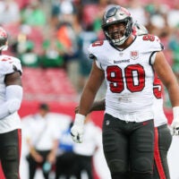 Sep 28, 2025; Tampa, Florida, USA; Tampa Bay Buccaneers defensive end Logan Hall (90) reacts after a play during the third quarter against the Philadelphia Eagles at Raymond James Stadium.