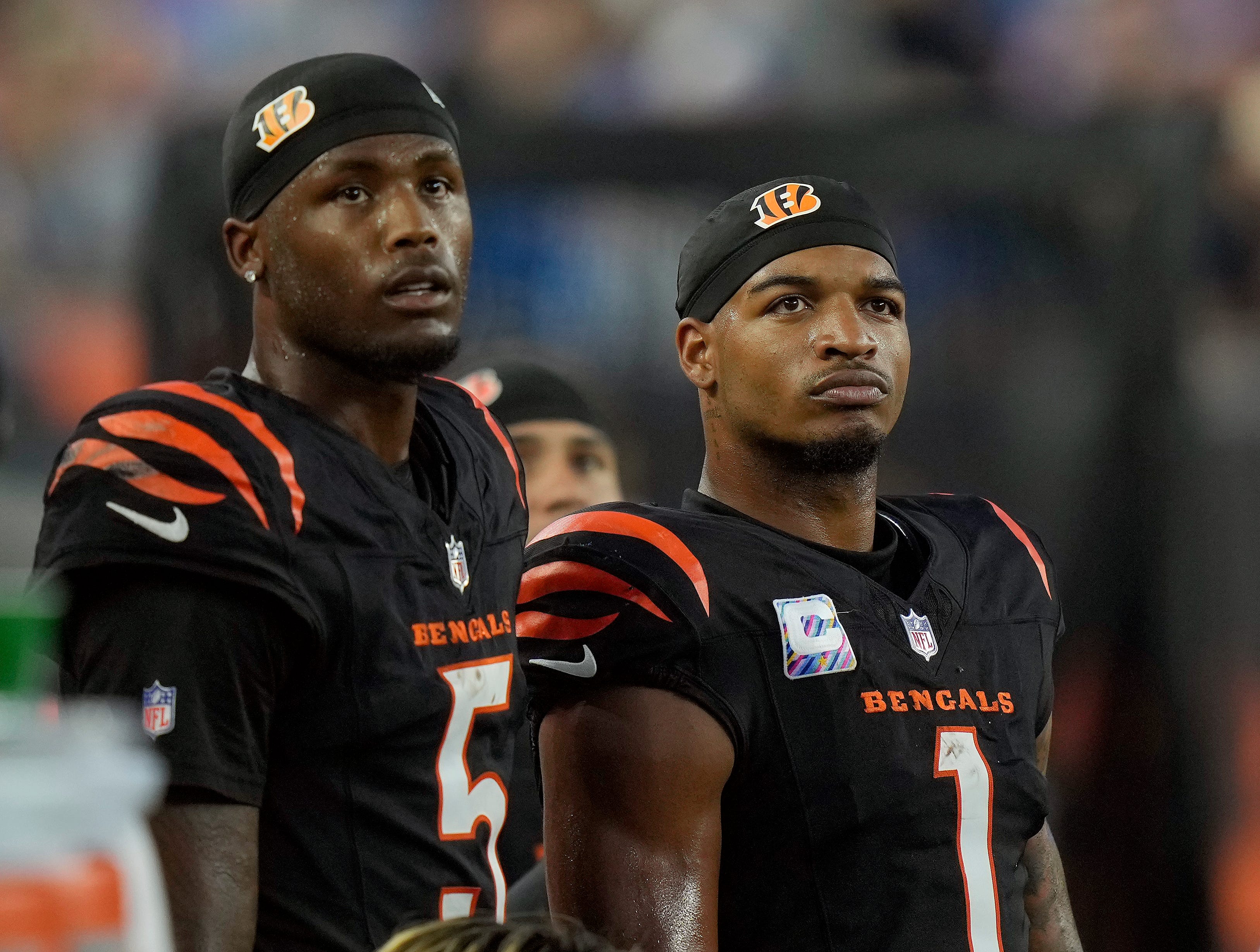 Cincinnati Bengals wide receiver Tee Higgins (5) and wide receiver Ja'Marr Chase (1) watch the score board as their team lose to the Detroit Lions 24-37 at Paycor Stadium on October 5, 2025.
