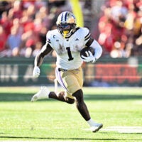 Oct 4, 2025; College Park, Maryland, USA; Washington Huskies running back Jonah Coleman (1) carries the ball against the Maryland Terrapins at SECU Stadium. Mandatory Credit: Jamie Sabau-Imagn Images