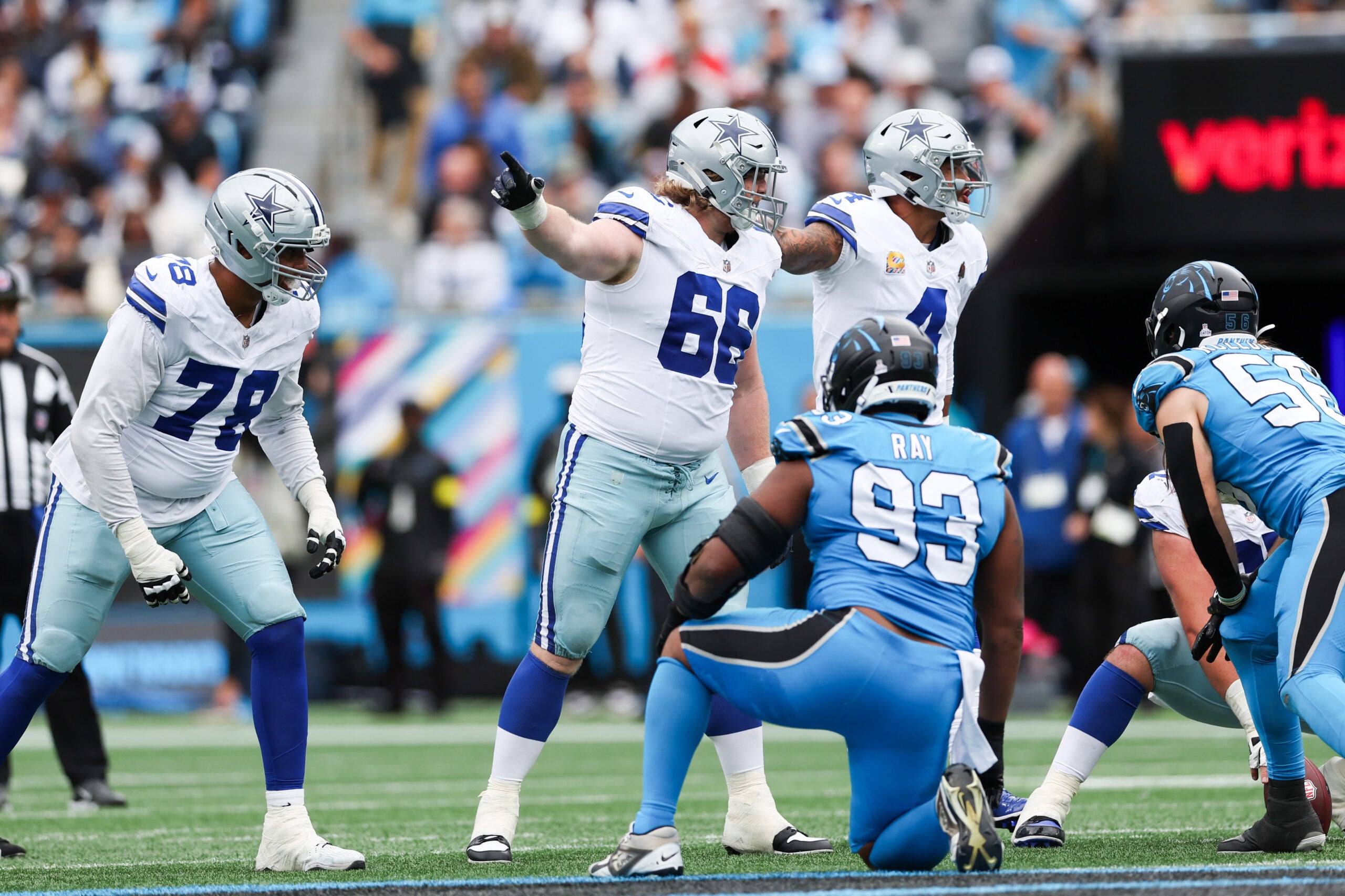 Oct 12, 2025; Charlotte, North Carolina, USA; Dallas Cowboys guard T.J. Bass (66) communicates during the second half against the Carolina Panthers at Bank of America Stadium.