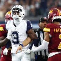 Oct 19, 2025; Arlington, Texas, USA; Dallas Cowboys wide receiver George Pickens (3) celebrates after a play as Washington Commanders safety Quan Martin (20) and cornerback Marshon Lattimore (2) look on during the second quarter of the game at AT&T Stadium.