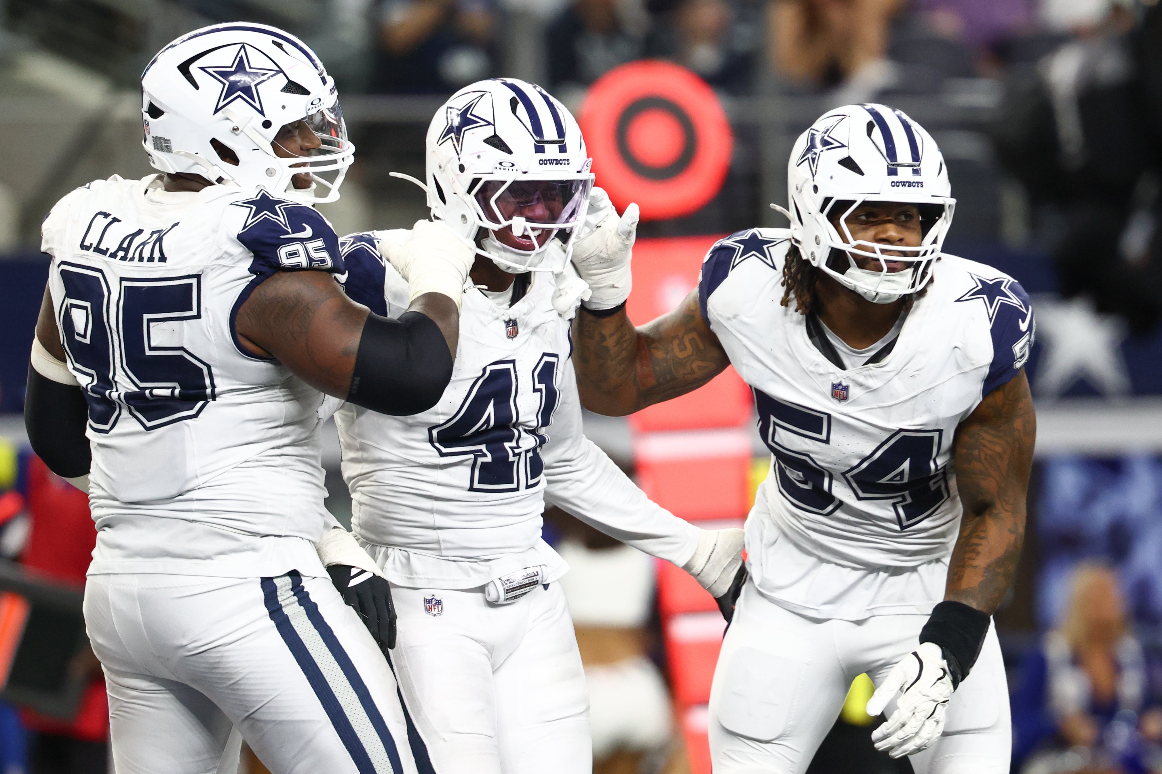 Oct 19, 2025; Arlington, Texas, USA; Dallas Cowboys defensive end Donovan Ezeiruaku (41) celebrates after a sack against the Washington Commanders during the fourth quarter of the game at AT&T Stadium.