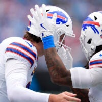 Oct 26, 2025; Charlotte, North Carolina, USA; Buffalo Bills running back James Cook III (4) celebrates with quarterback Josh Allen (17) after scoring a touchdown during the second half against the Carolina Panthers at Bank of America Stadium.