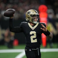 Oct 26, 2025; New Orleans, Louisiana, USA; New Orleans Saints quarterback Spencer Rattler (2) throws downfield during the first quarter against the Tampa Bay Buccaneers at Caesars Superdome.