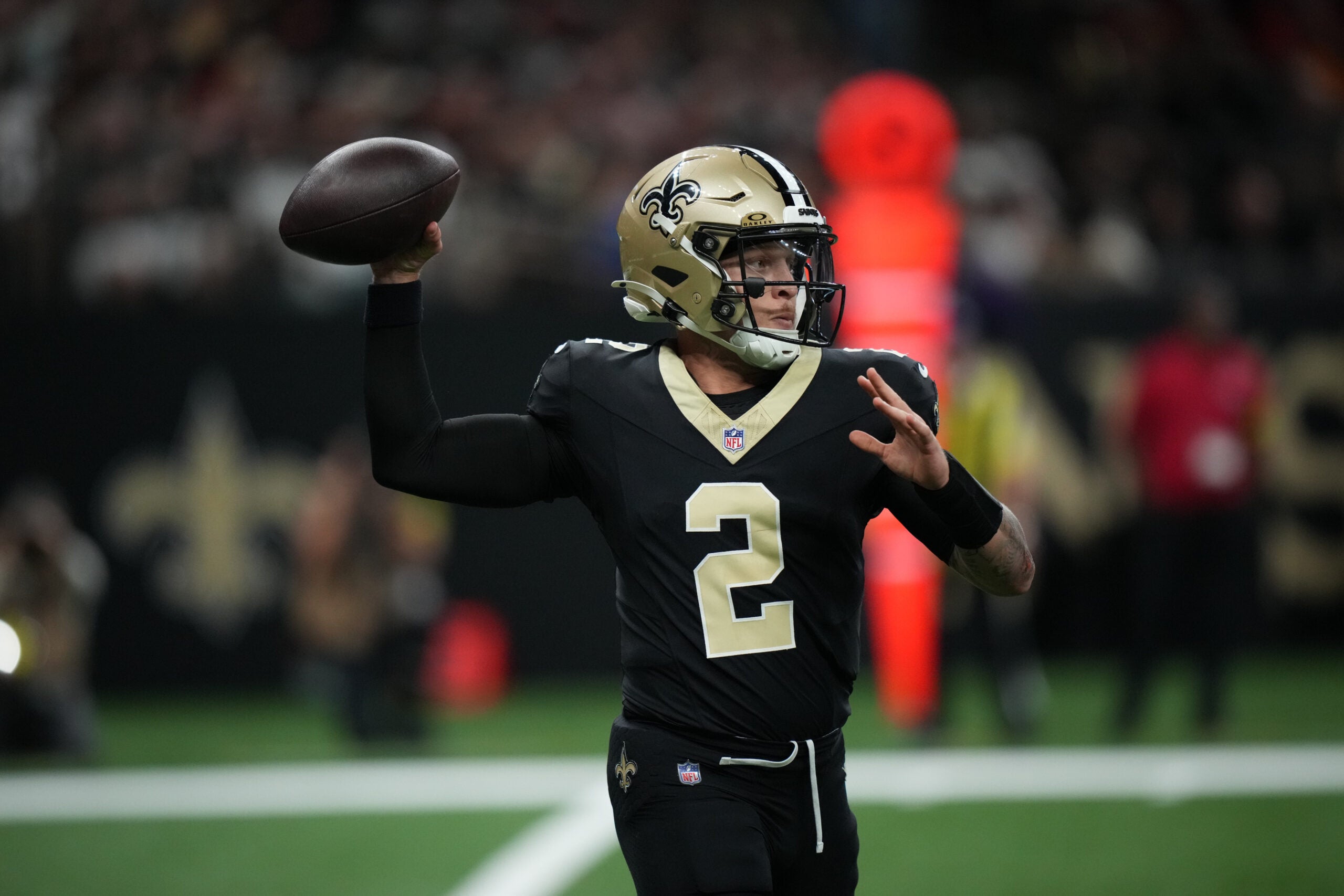 Oct 26, 2025; New Orleans, Louisiana, USA; New Orleans Saints quarterback Spencer Rattler (2) throws downfield during the first quarter against the Tampa Bay Buccaneers at Caesars Superdome.