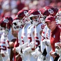 Oklahoma head coach Brent Venables lines up with the team before the Red River Rivalry college football game between the University of Oklahoma Sooners and the Texas Longhorn at the Cotton Bowl Stadium in Dallas, Texas, Saturday, Oct. 11, 2025.