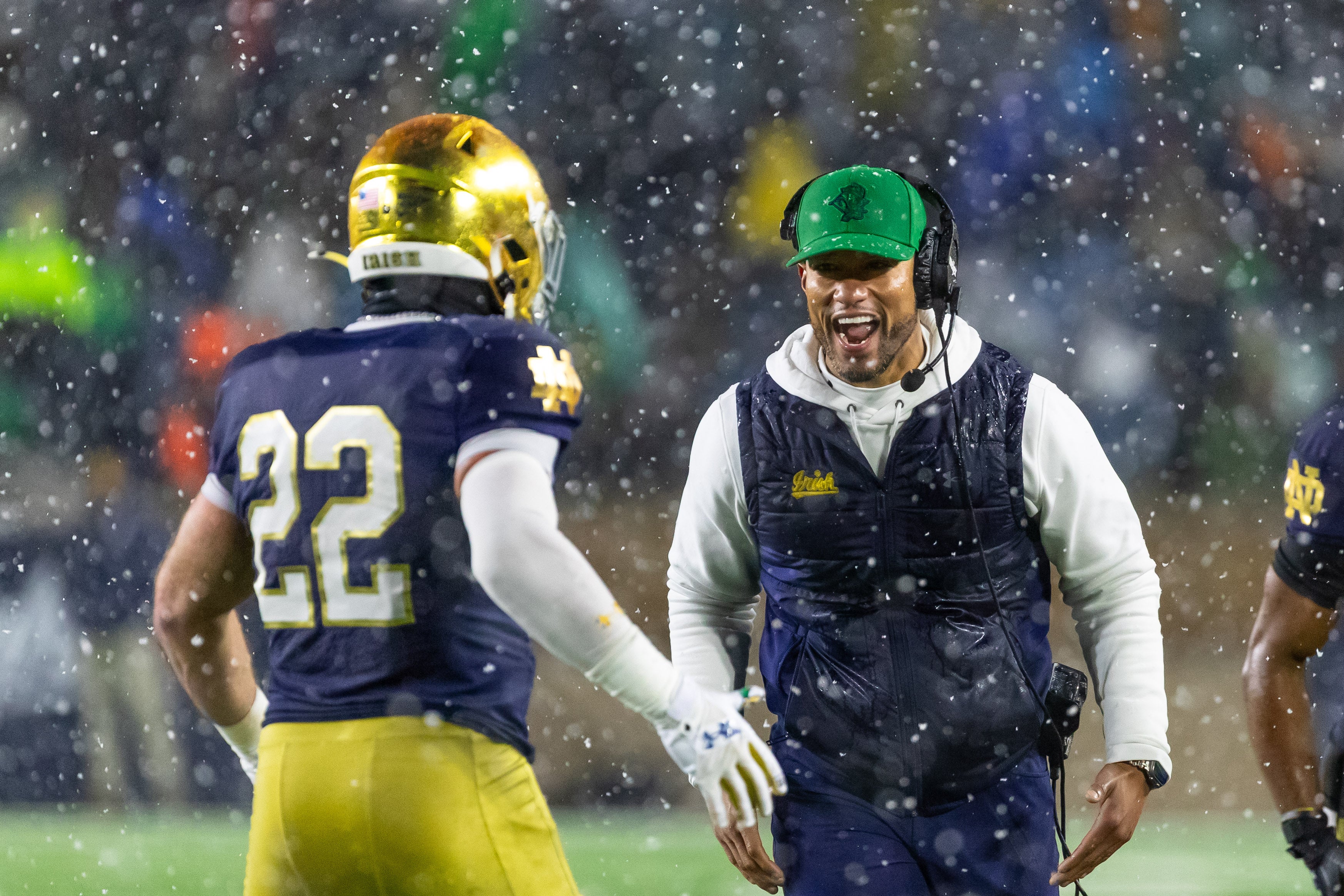 Nov 8, 2025; South Bend, Indiana, USA; Notre Dame Fighting Irish head coach Marcus Freeman celebrates with running back Aneyas Williams (22) after he scored a touchdown against the Navy Midshipmen during the second half at Notre Dame Stadium. Mandatory Credit: Michael Caterina-Imagn Images