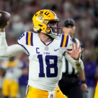 Nov 8, 2025; Tuscaloosa, Alabama, USA; LSU quarterback Garrett Nussmeier (18) throws a pass during the second half of the game with Alabama at Saban Field at Bryant-Denny Stadium. Alabama defeated LSU 20-9. Mandatory Credit: Gary Cosby Jr.-Imagn Images