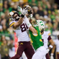 Nov 14, 2025; Eugene, Oregon, USA; Oregon Ducks defensive back Dillon Thieneman (31) breaks up a pass play intended for Minnesota Golden Gophers tight end Jameson Geers (86) during the first half at Autzen Stadium.