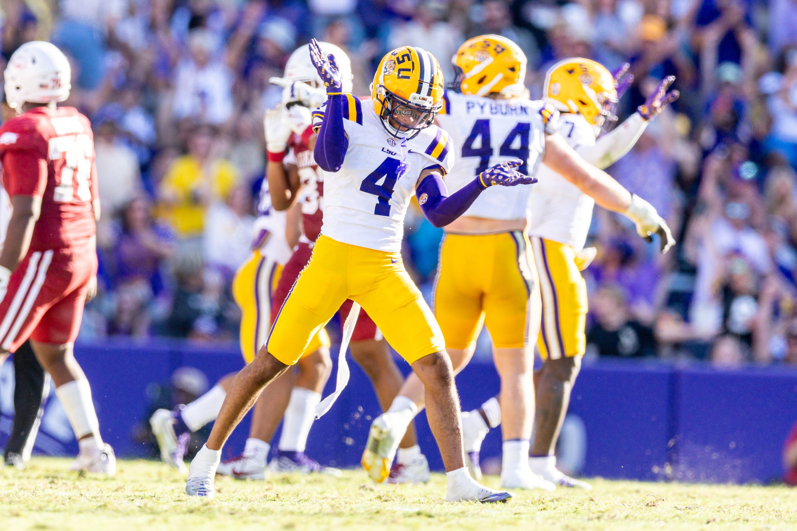 Nov 15, 2025; Baton Rouge, Louisiana, USA; LSU Tigers cornerback Mansoor Delane (4) reacts to a stop on fourth down against the Arkansas Razorbacks during the second half at Tiger Stadium. Mandatory Credit: Stephen Lew-Imagn Images