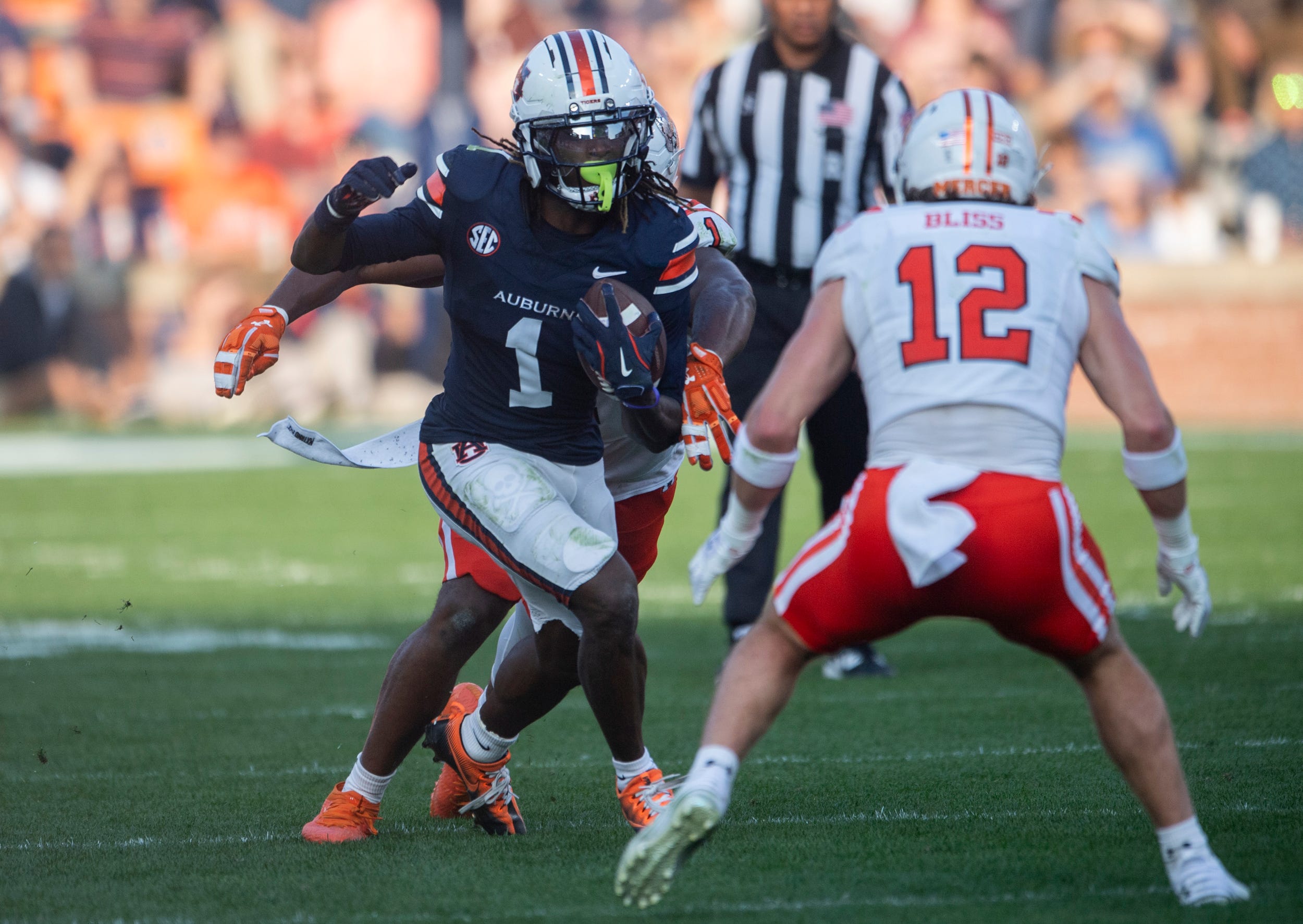 Auburn Tigers wide receiver Eric Singleton Jr. (1) turns up field after a catch as Auburn Tigers take on Mercer Bears at Jordan-Hare Stadium in Auburn, Ala. on Saturday, Nov. 22, 2025. Auburn Tigers defeated the Mercer Bears 62-17.