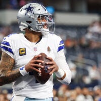 Nov 23, 2025; Arlington, Texas, USA; Dallas Cowboys quarterback Dak Prescott (4) warms up before the game against the Philadelphia Eagles at AT&T Stadium.