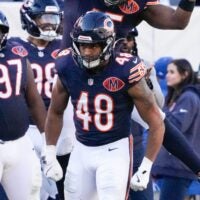 Nov 23, 2025; Chicago, Illinois, USA; Chicago Bears linebacker D'Marco Jackson (48) reacts after a defensive stop during the second half at Soldier Field.