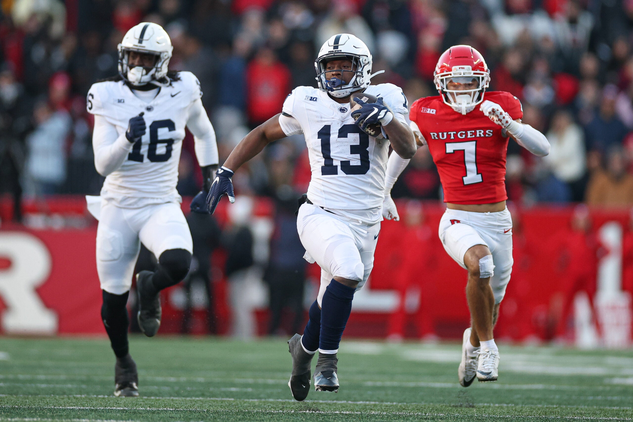 Nov 29, 2025; Piscataway, New Jersey, USA; Penn State Nittany Lions running back Kaytron Allen (13) runs wiut the ball during the first half against the Rutgers Scarlet Knights at SHI Stadium. Mandatory Credit: Vincent Carchietta-Imagn Images